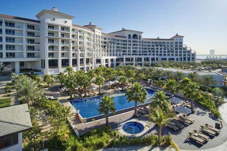 hotel exterior with pools